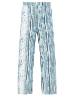 THEBE MAGUGU Feather-trimmed shredded denim-print cotton jeans