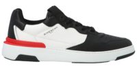 black low top sneaker with red stripe