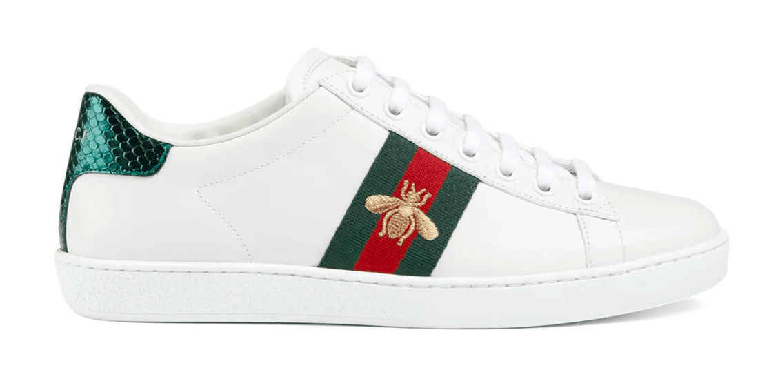 white leather sneaker with green and red stripe