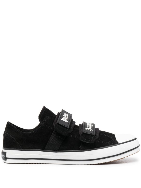 black low top canvas trainers