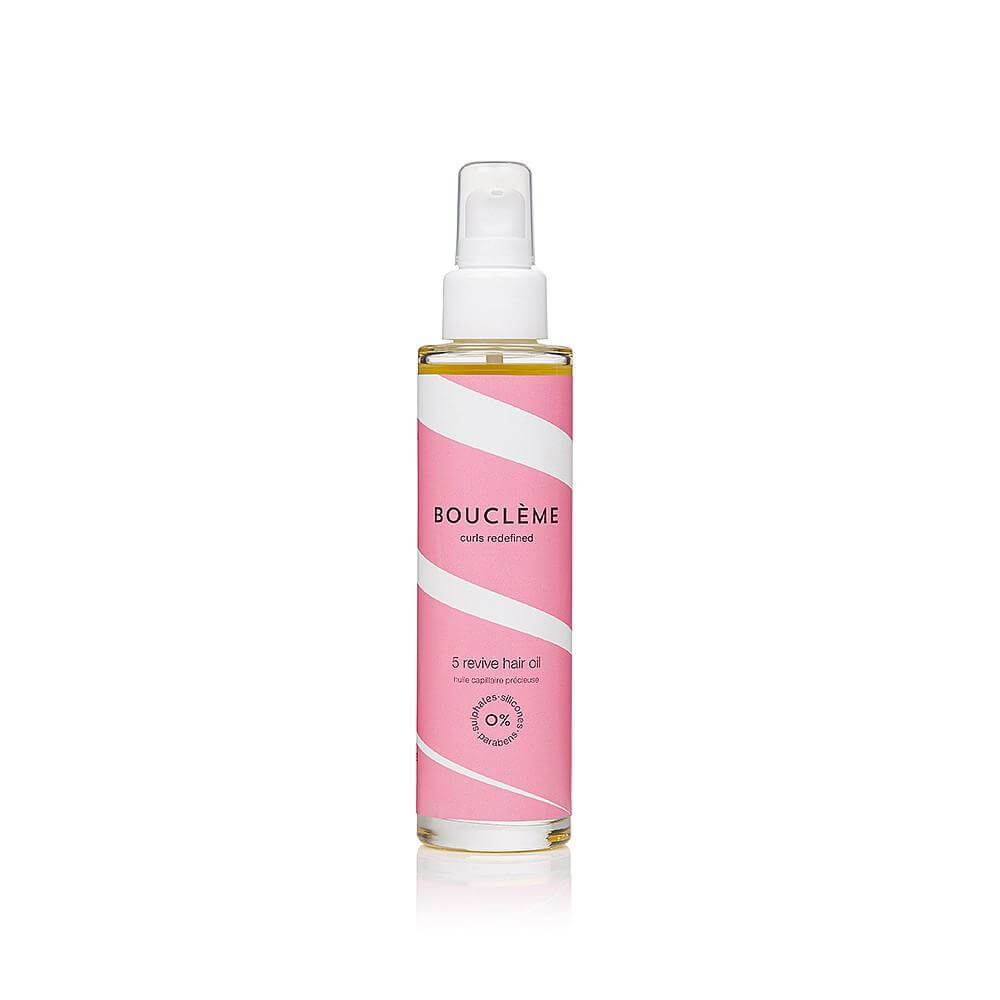 Pink bottle of hair oil