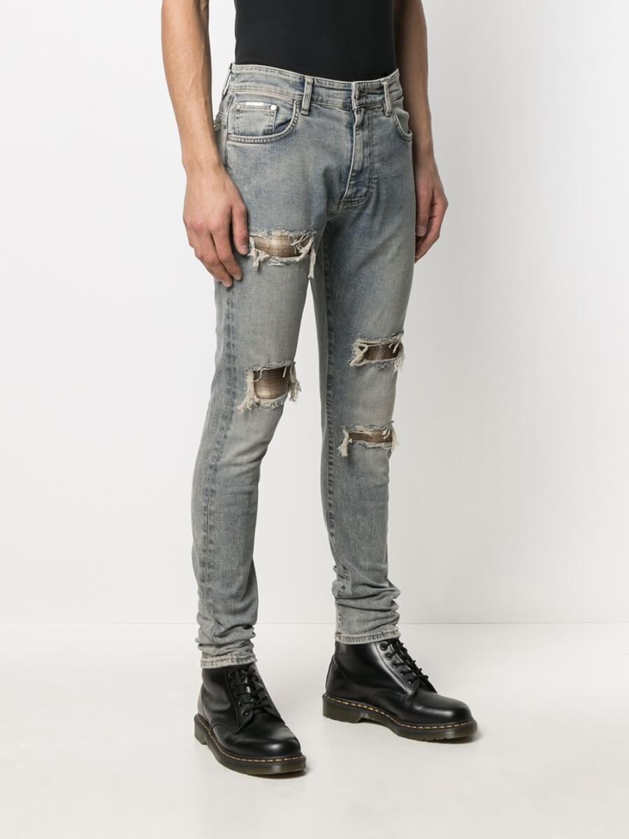 Light grey distressed flannel-layered jeans