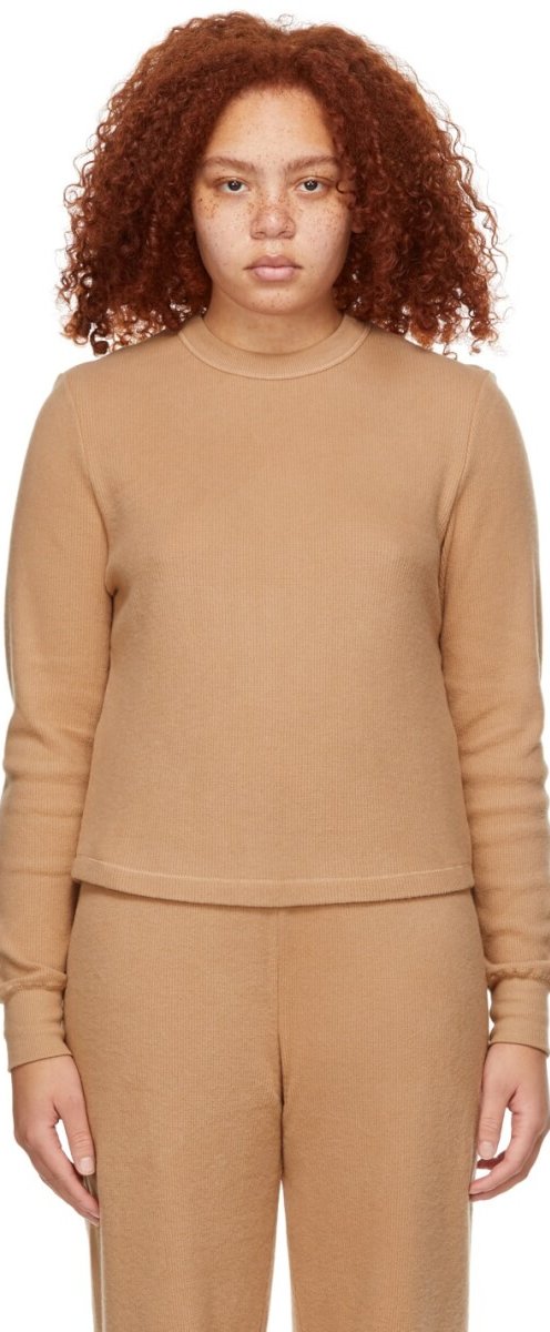 Long sleeve stretch brushed waffle knit cotton-blend T-shirt in tan. Rib knit crewneck collar and cuffs.