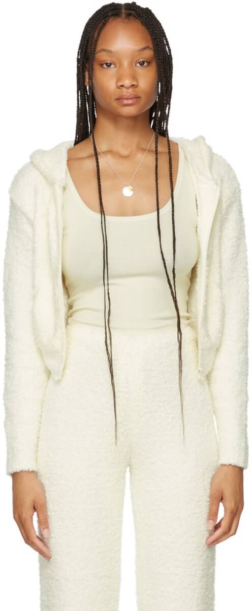 Long sleeve nylon-blend bouclé hoodie in off-white. Zip closure at front. Patch pockets at waist. Rib knit cuffs and cropped hem. Tonal hardware.
