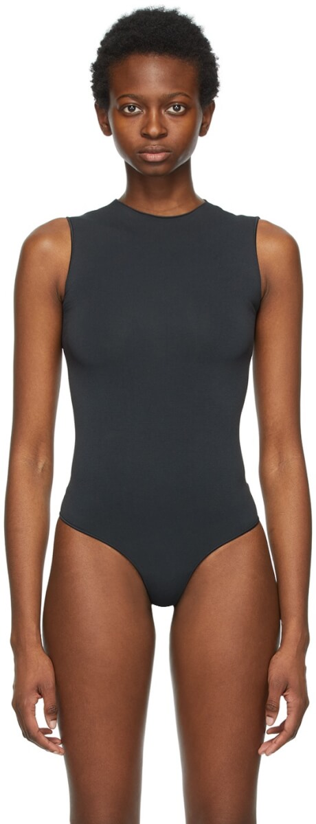 Sleeveless stretch nylon jersey bodysuit in black. Crewneck collar. Press-stud fastening at thong-style bottom. Partially lined. Tonal hardware.