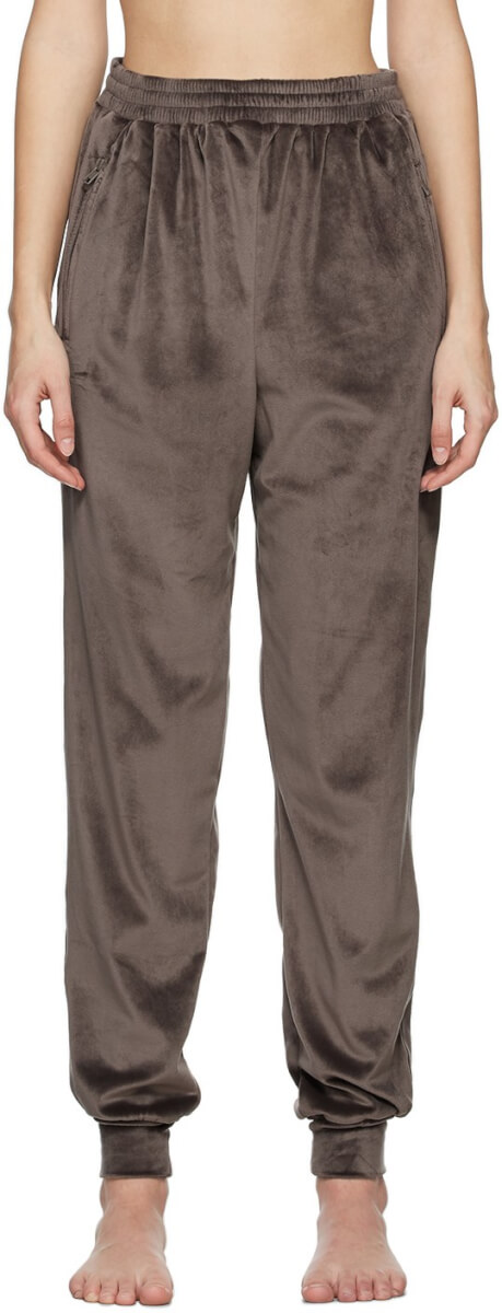Relaxed-fit stretch cotton velour lounge pants in taupe. Mid-rise. Two-pocket styling. Concealed drawstring at elasticized waistband. Paneled cuffs. Tonal hardware.