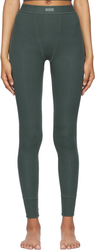 Stretch rib knit cotton leggings in green. High-rise. Tonal logo patch at elasticized waistband.