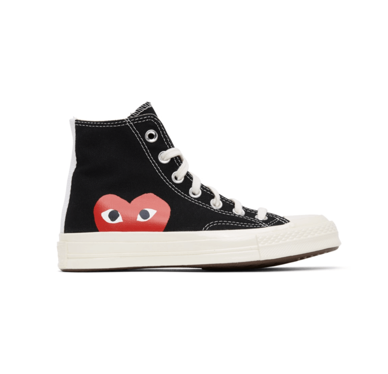 black high top converse with half a heart peeping out