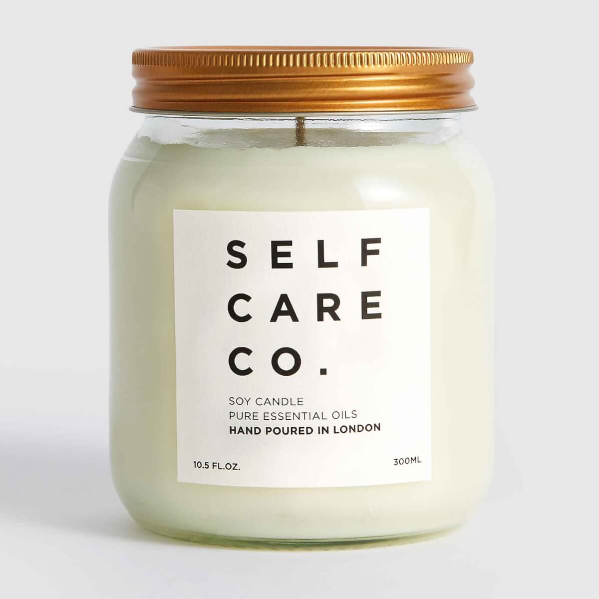 must-have wellness products Self Care Co. Glass Jar Vetiver, Cedarwood + Bergamot Soy Aromatherapy Candle 300g