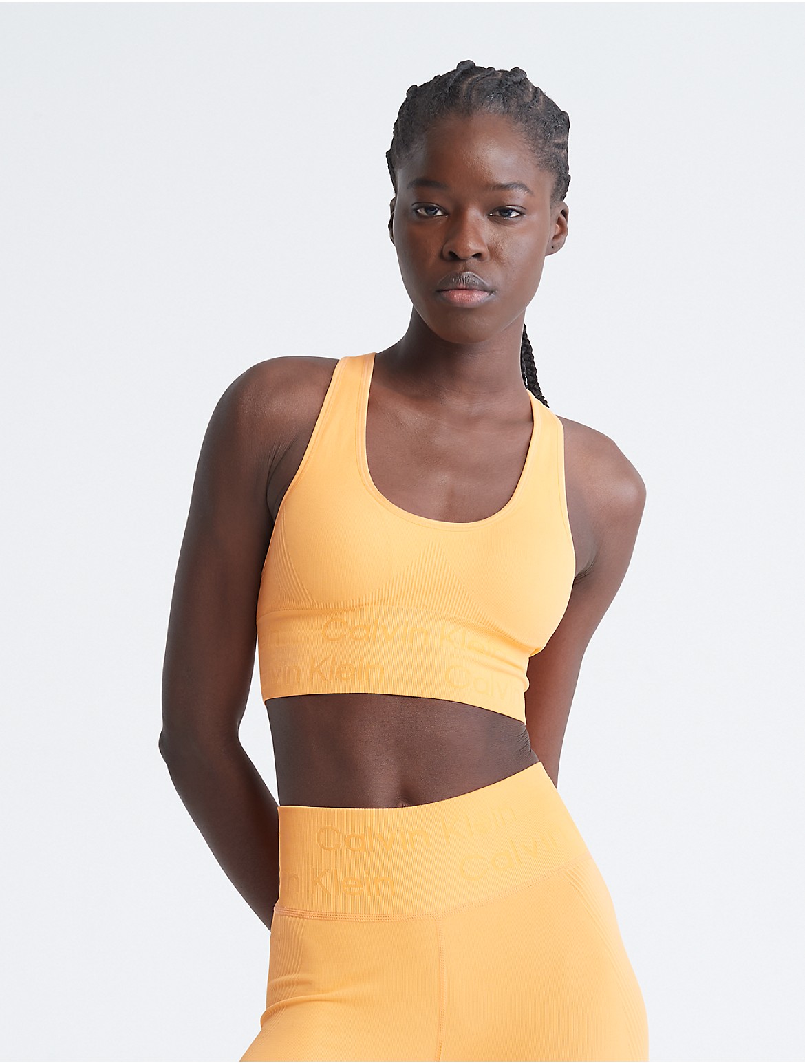 Calvin Klein Women's Performance Seamless Medium Impact Sports Bra - Orange  - XL - Modafirma
