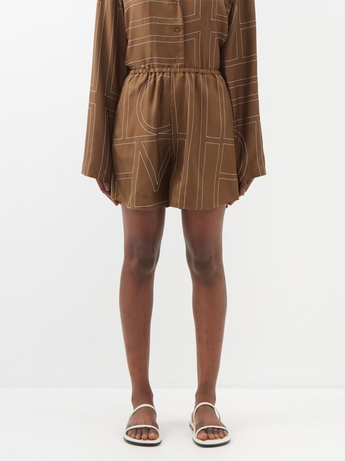 Toteme - Monogram-embroidered Silk Shorts - Womens - Dark Brown