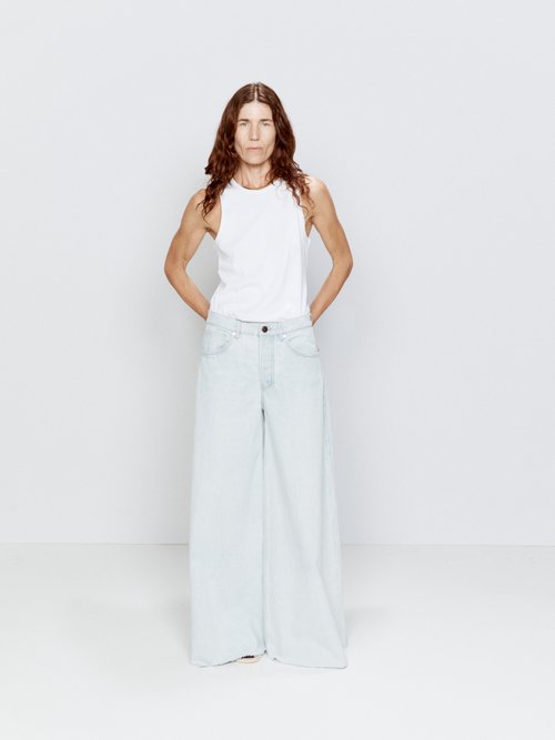 Raey - Loon Organic-cotton Flared Jeans - Womens - Light Indigo